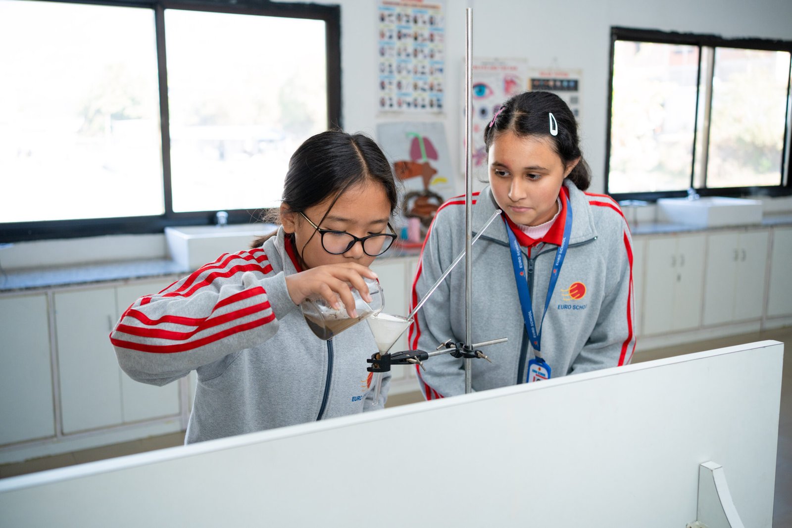 Euro School Laboratories -students testing the chemicals