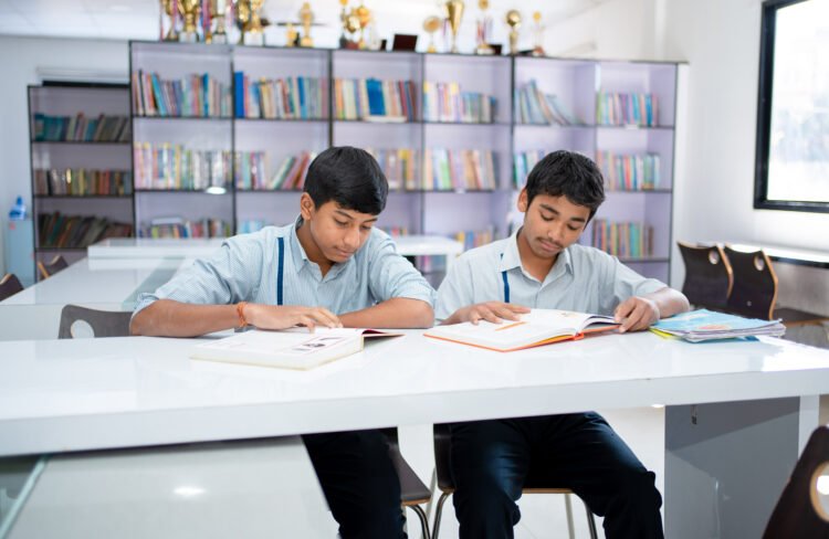 Euro School Library - Students reading books